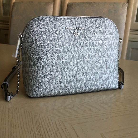 Michael Kors Handbags - Michael Kors Cindy Silver Dome Crossbody Bag